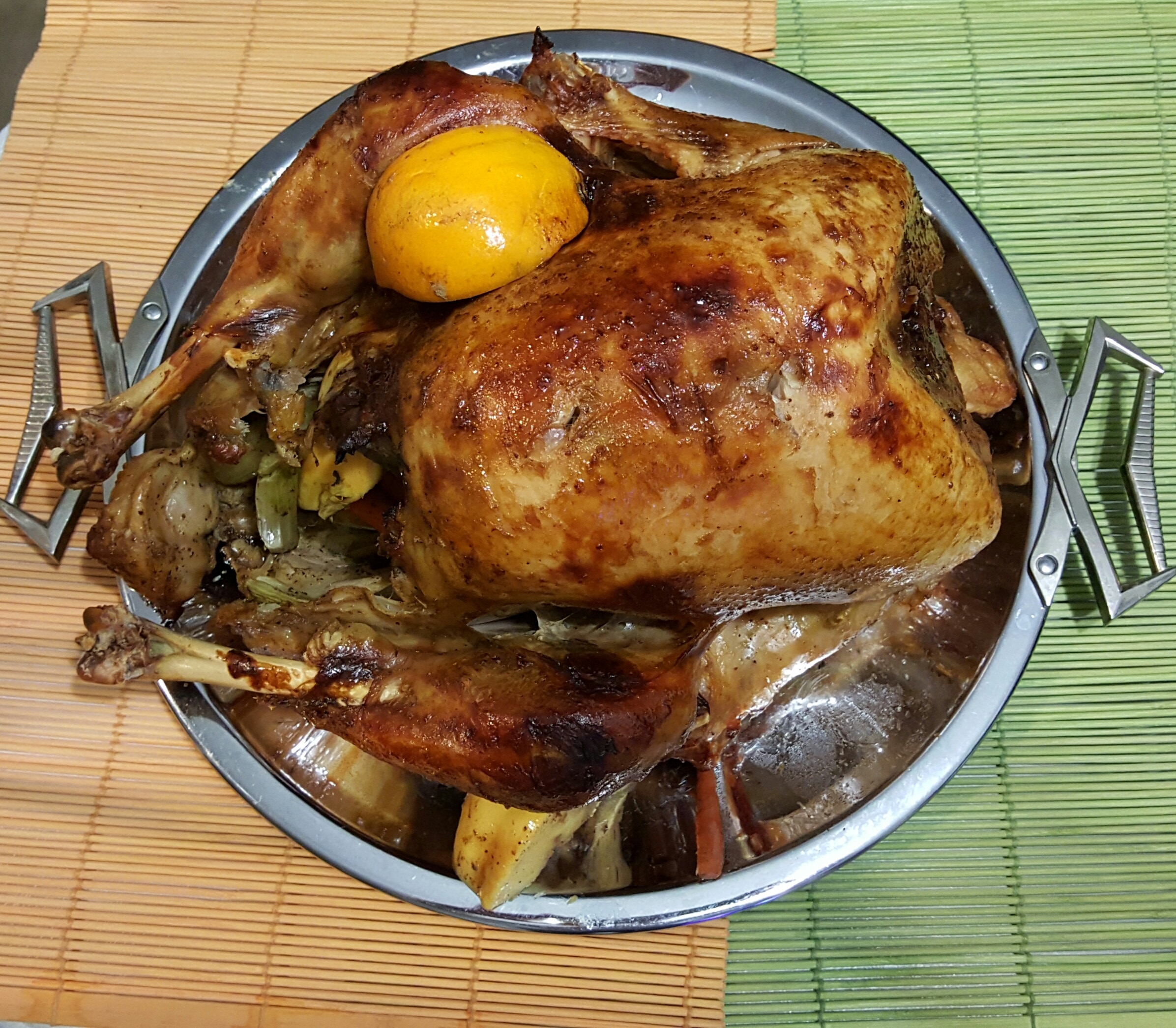 roast chicken on gray round container