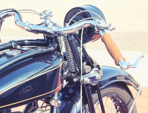 silver and blue cruiser motorcycle thumbnail