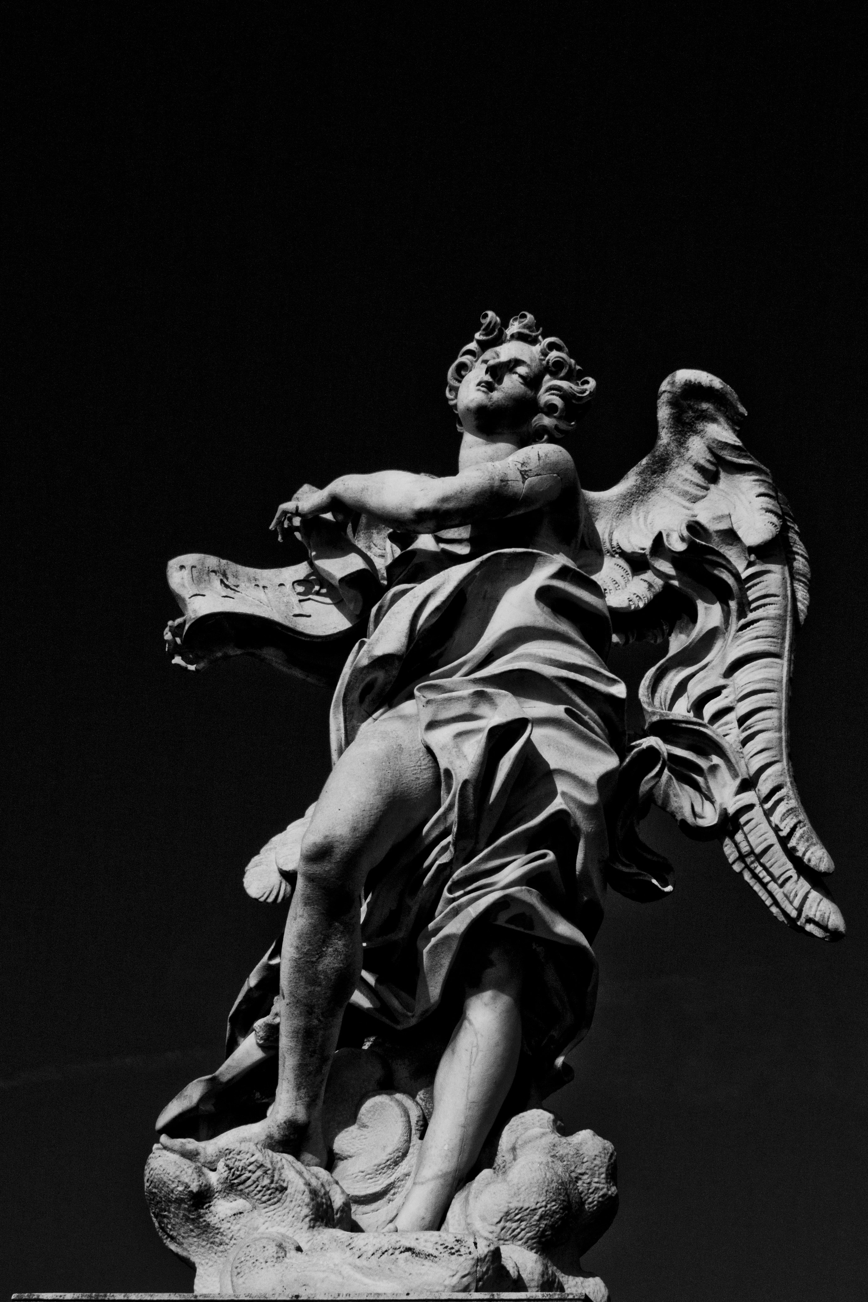 gray statue angel