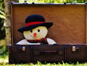 snowman wearing black and red hat plush toy thumbnail