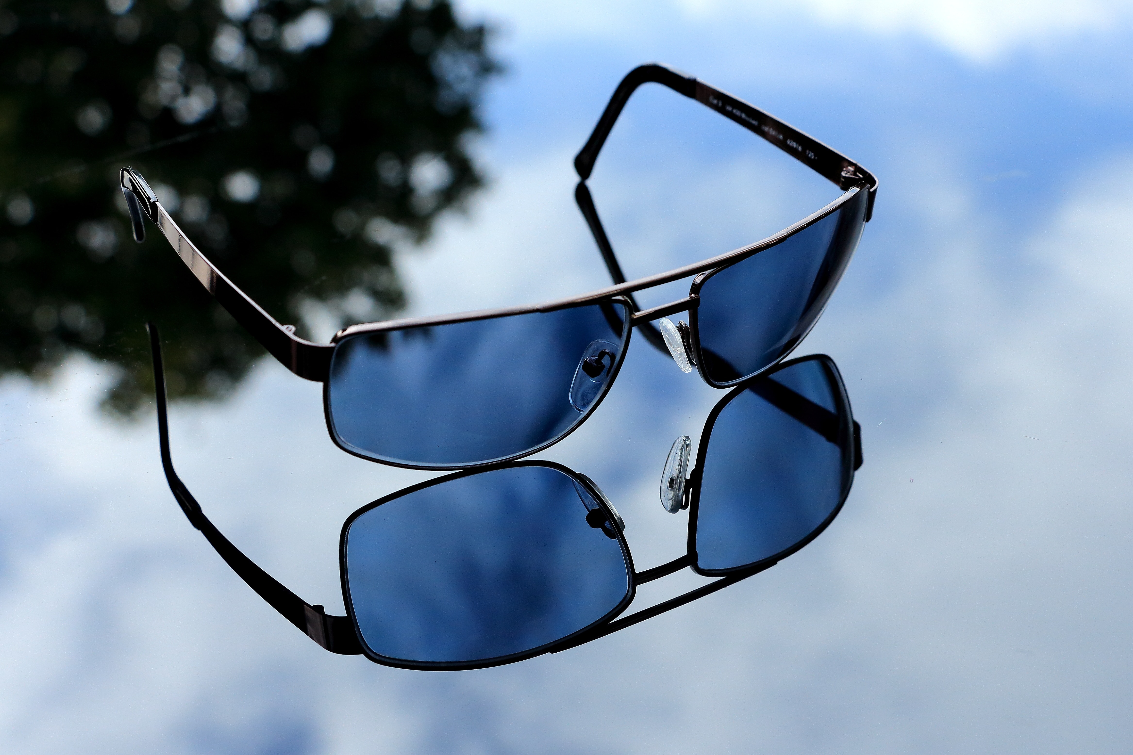silver frame black lens sunglasses