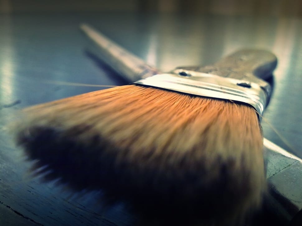 brown paint brush in gray surface preview