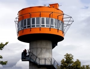 orange and gray concrete tower building thumbnail