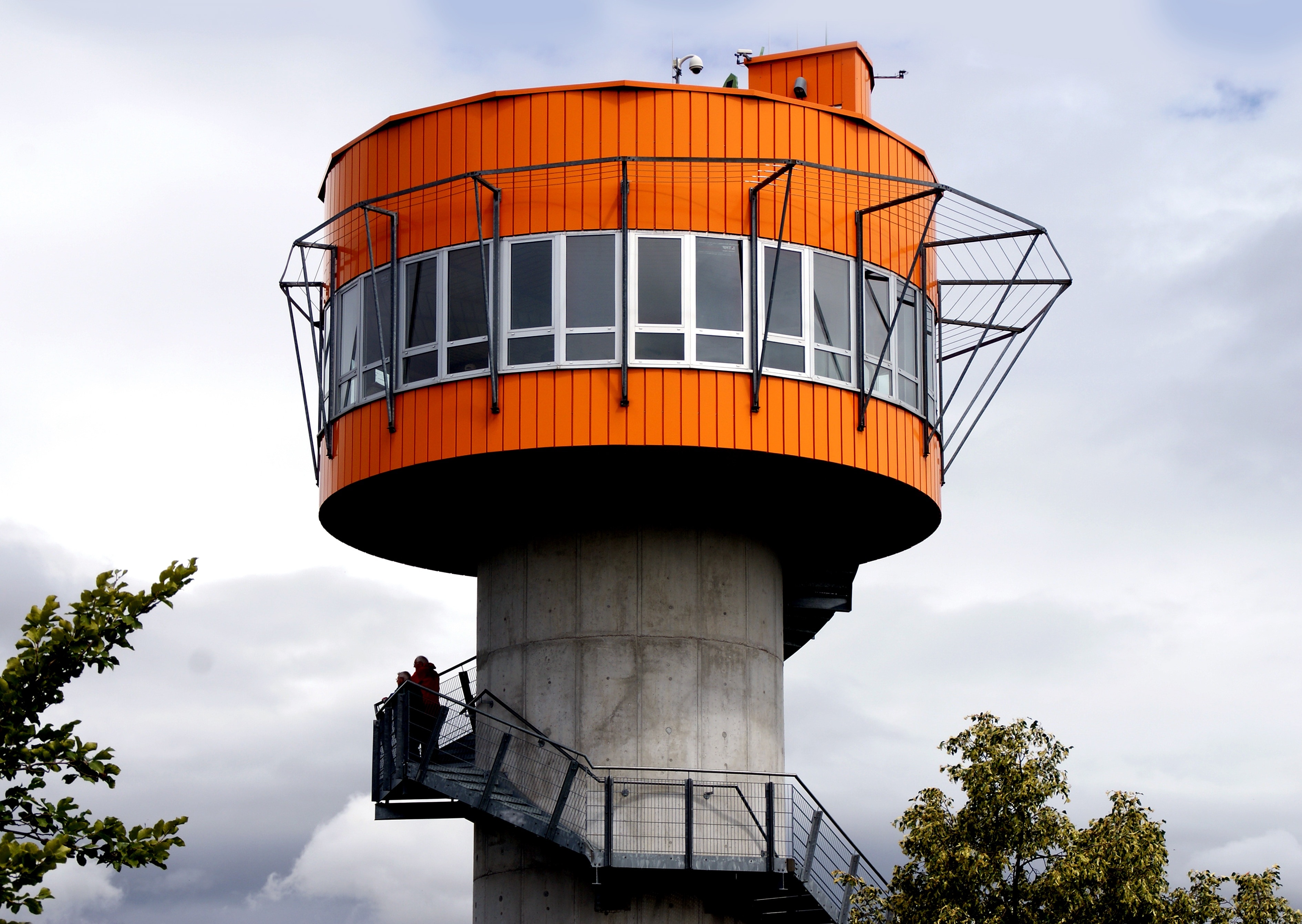 orange and gray concrete tower building