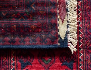 red and black textile thumbnail