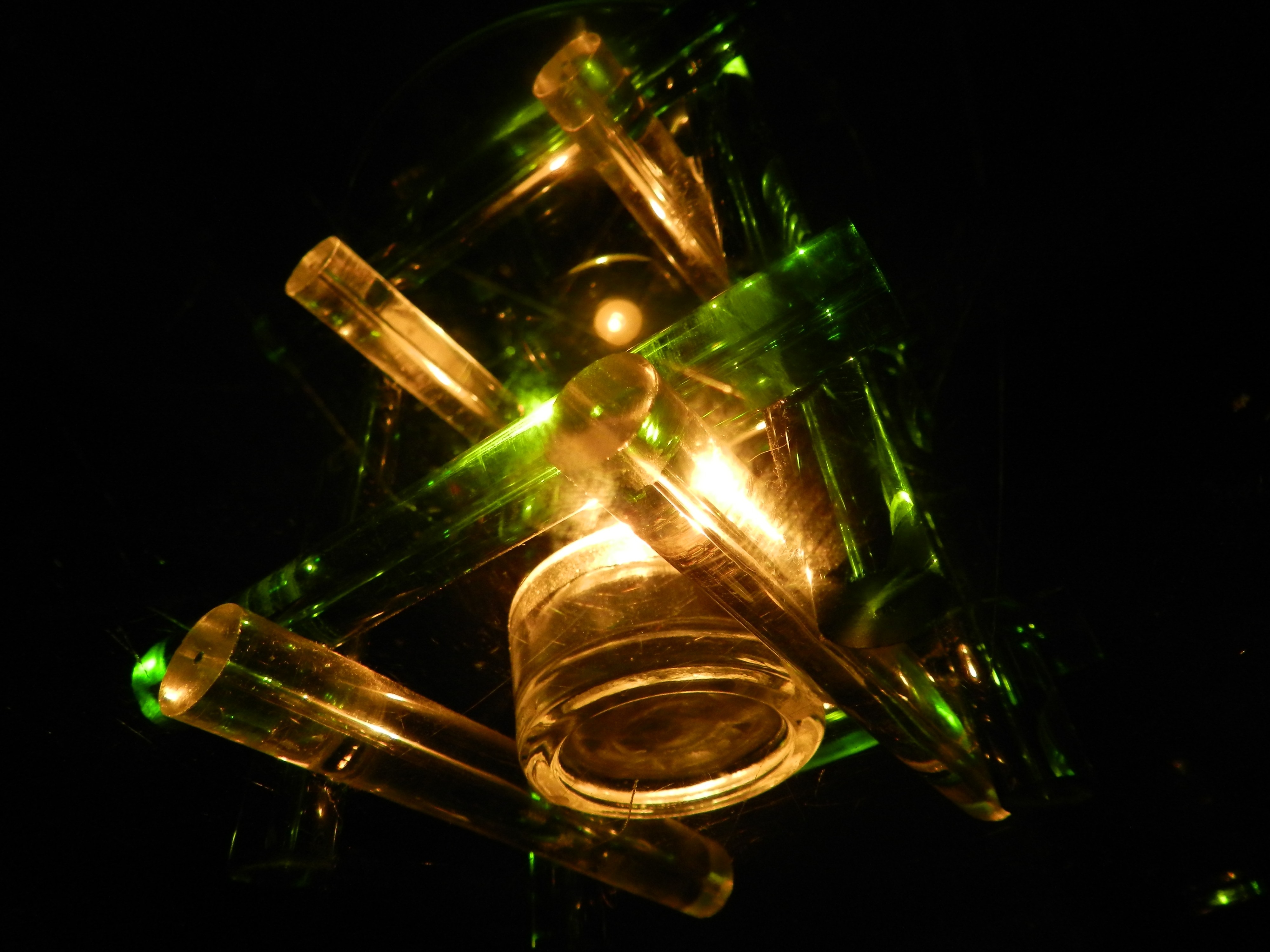 green and clear glass lantern