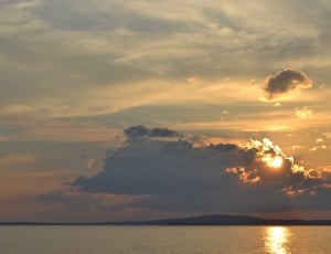 panoramic photo of sea during sunset thumbnail