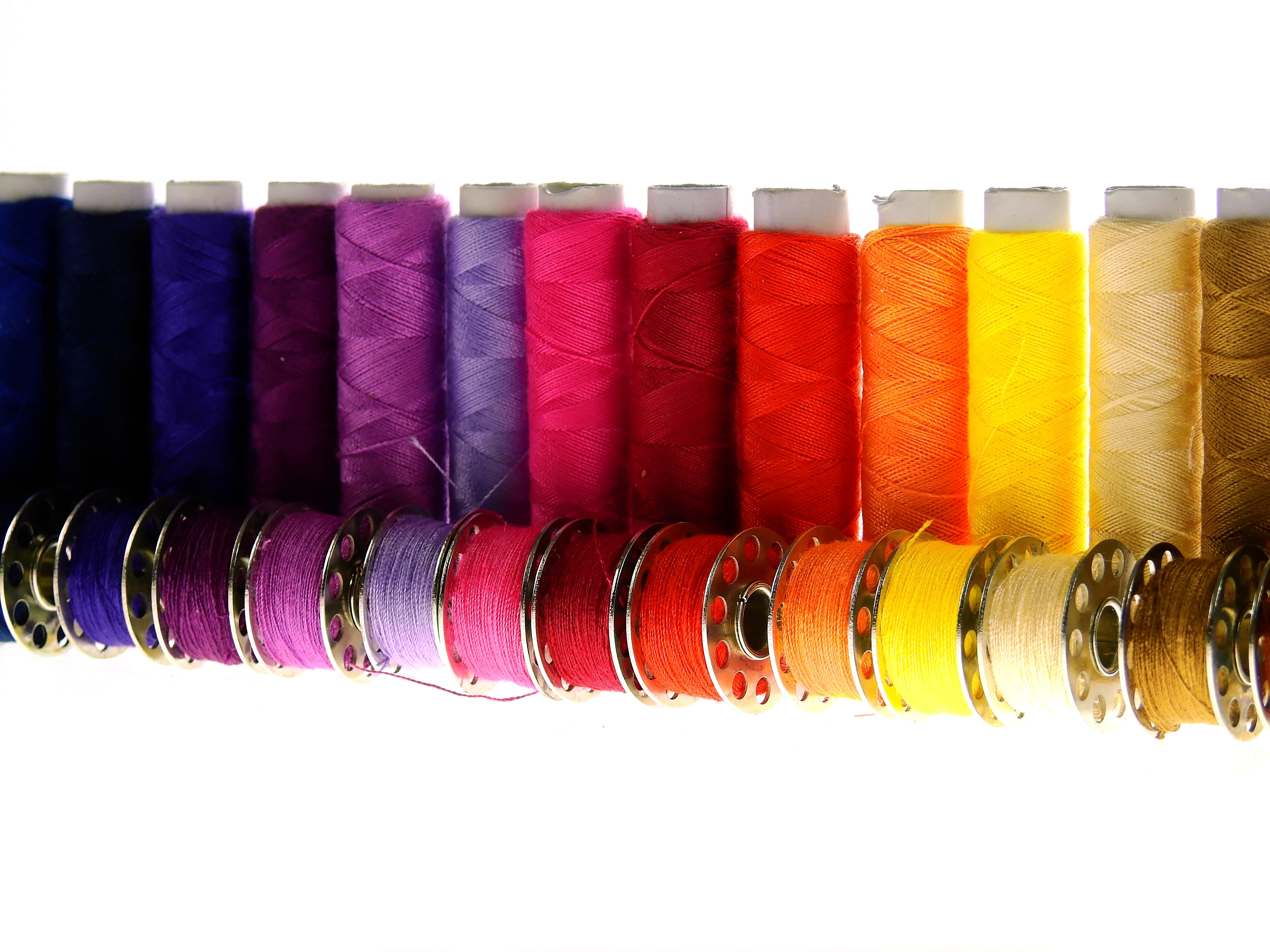 assorted color thread spools
