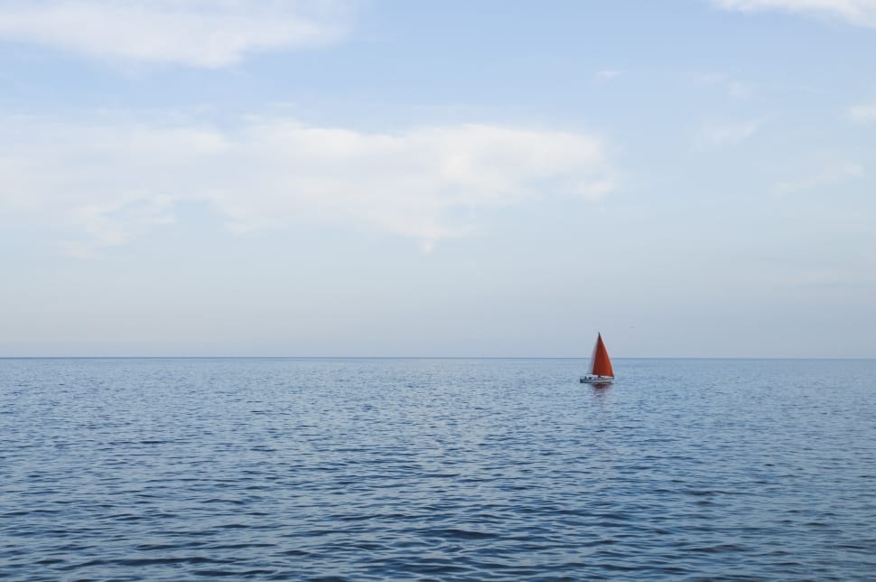red sail boat preview