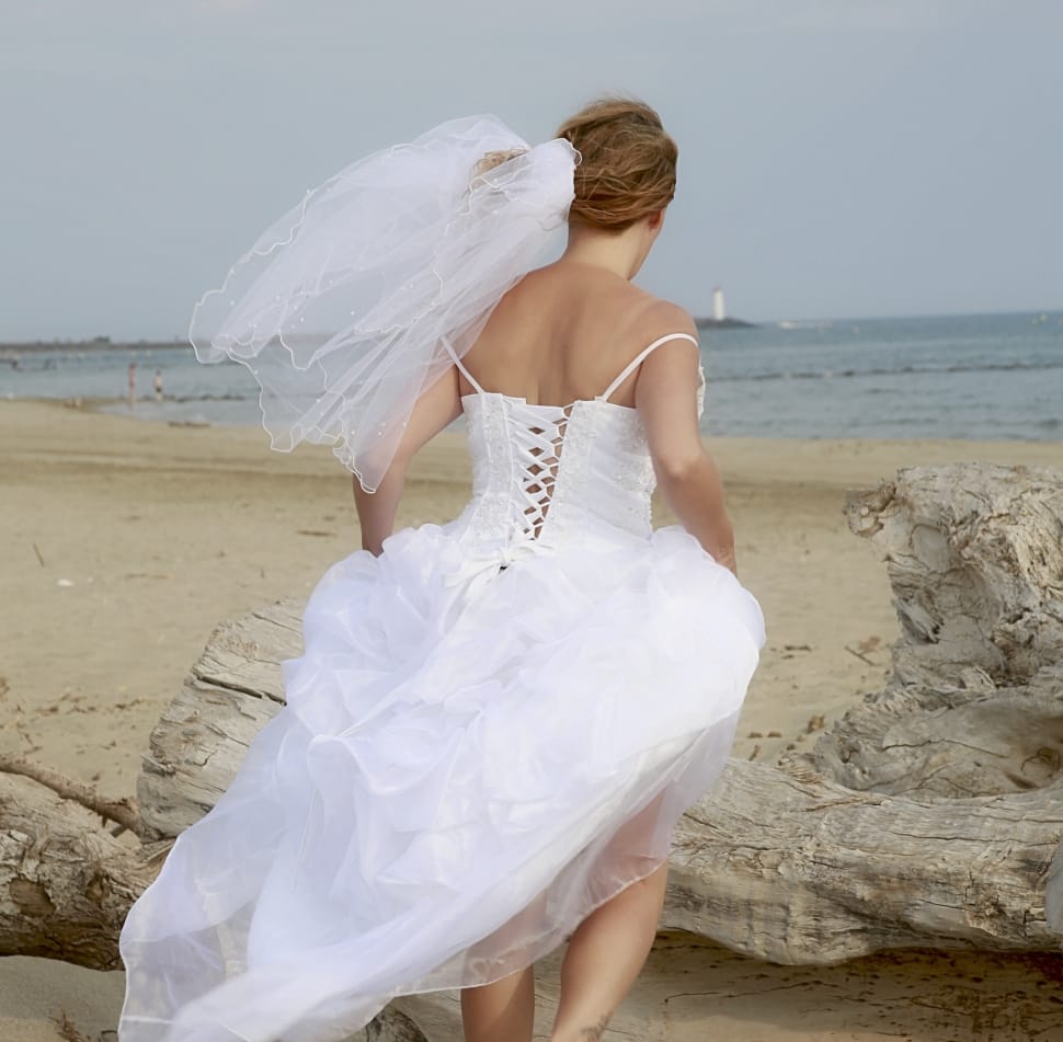 women's white spaghetti strap wedding dress and headress preview