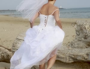 women's white spaghetti strap wedding dress and headress thumbnail