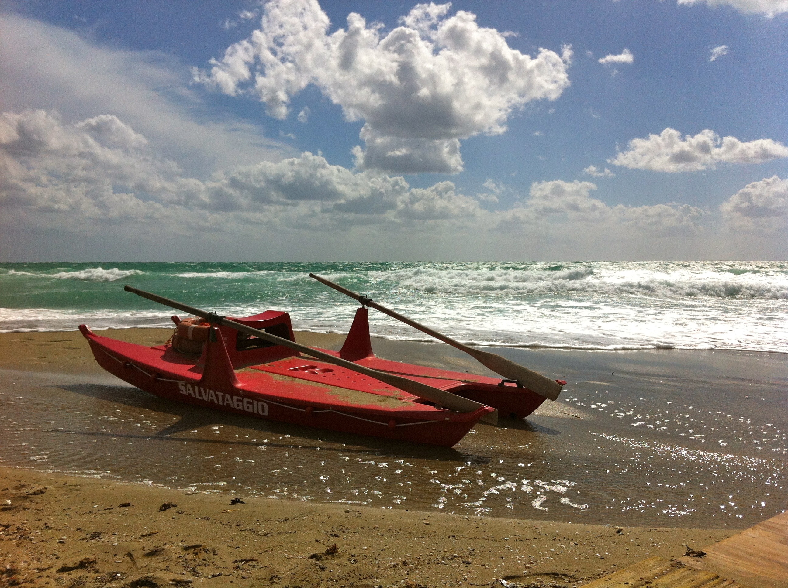 red raft with paddles