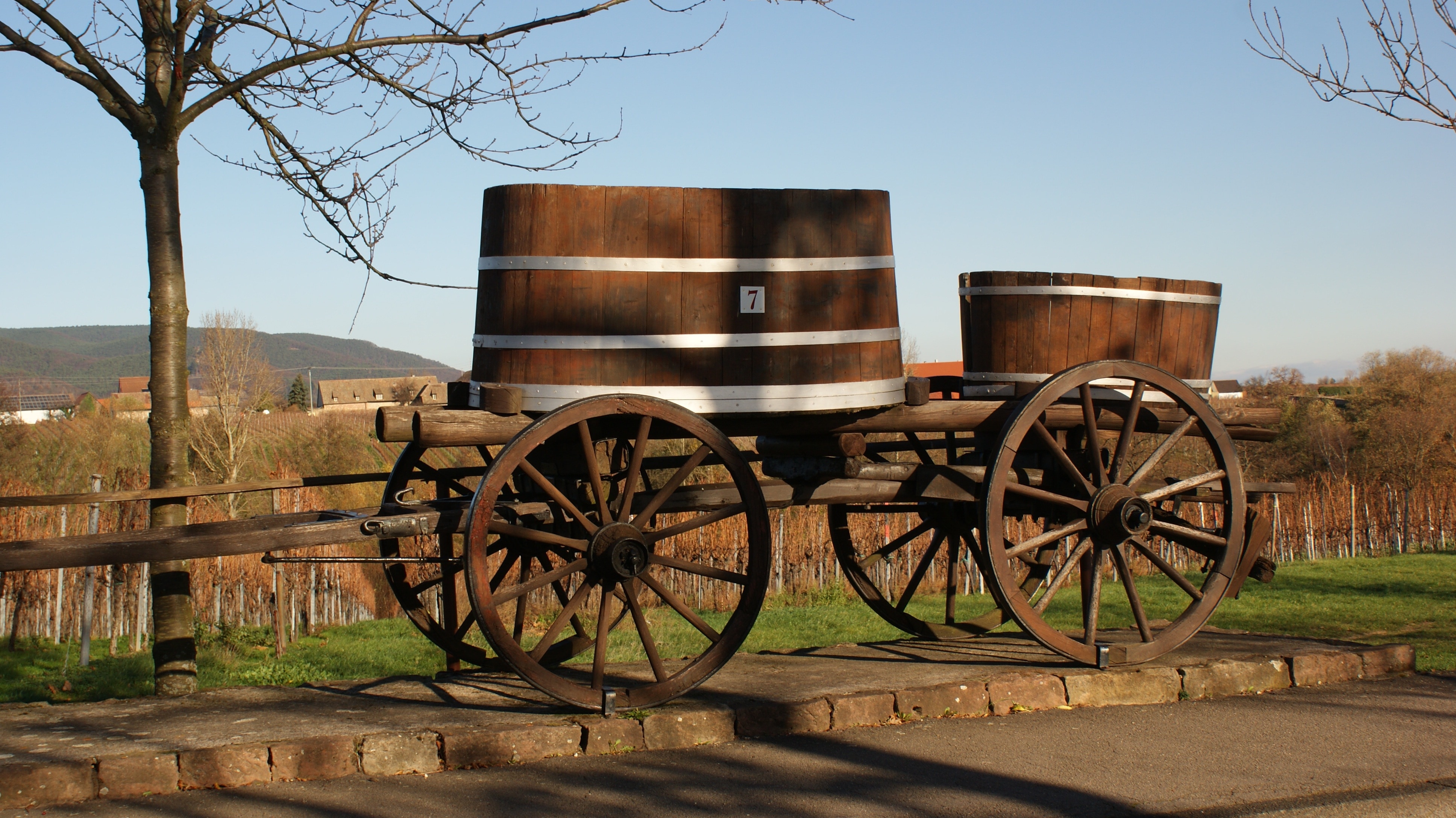 2 brown wooden barrels