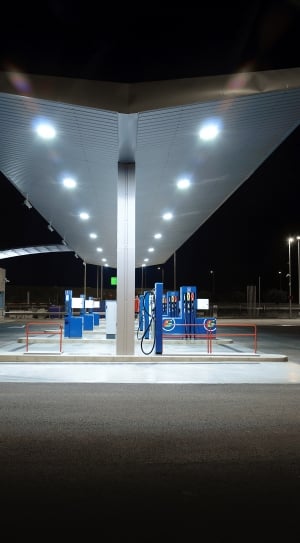 structural shot of gas station during night time thumbnail