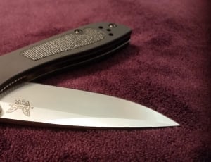 black handled pocket knife thumbnail