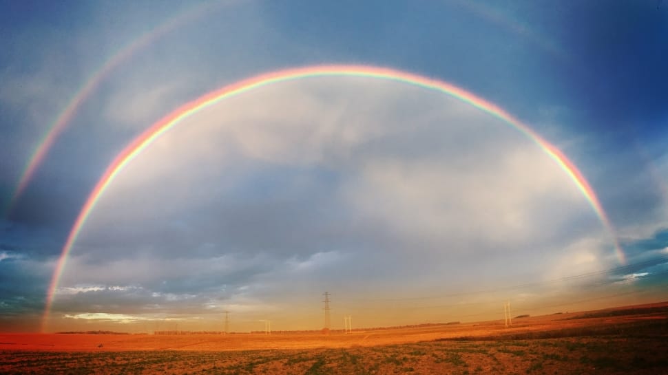 panoramic photography of two layer rainbow in dessert preview