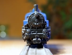 close up photo of black and light-blue train toy thumbnail