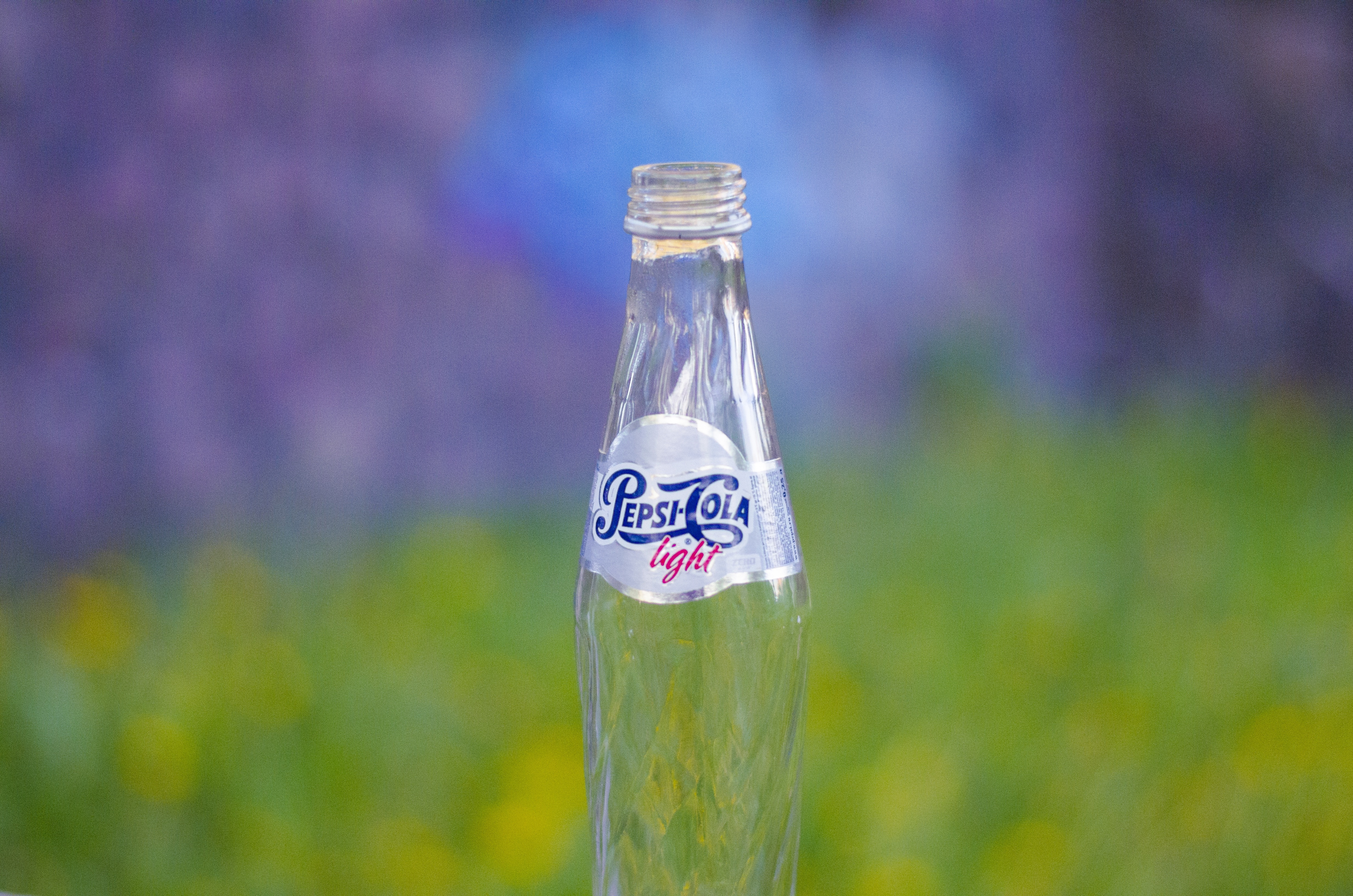 clear pepsi cola bottle