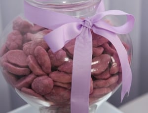 clear glass jar with ribbon and cookies thumbnail