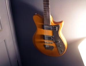 brown and silver electric guitar thumbnail