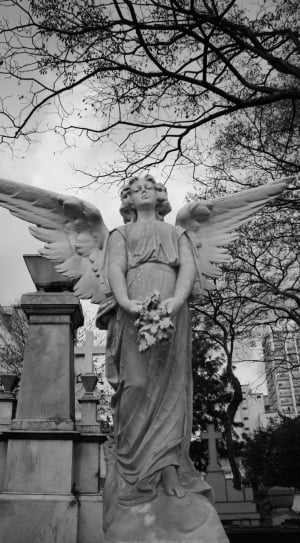 angel woman concrete statue thumbnail