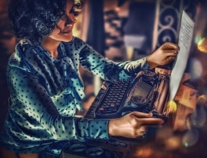 woman using typewriter painting thumbnail