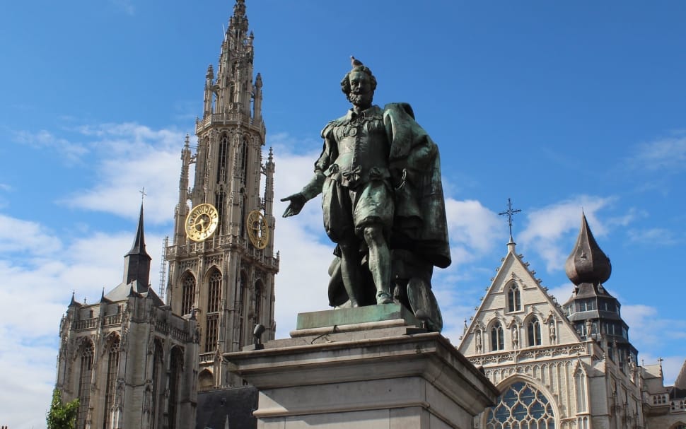knight statue on top of a building during daytime preview