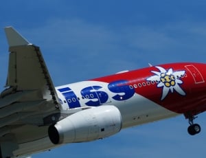 red blue and white airplane thumbnail
