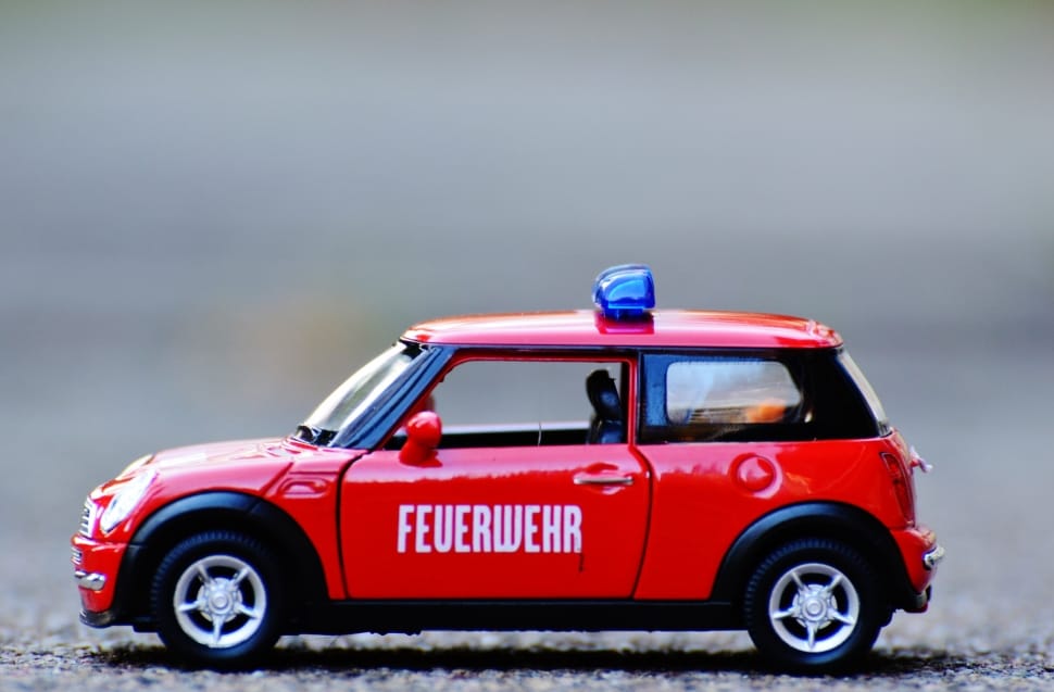 red 3 door hatchback die cast toy car preview