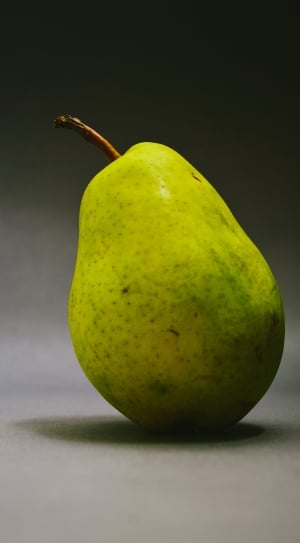 green fruit on white surface thumbnail