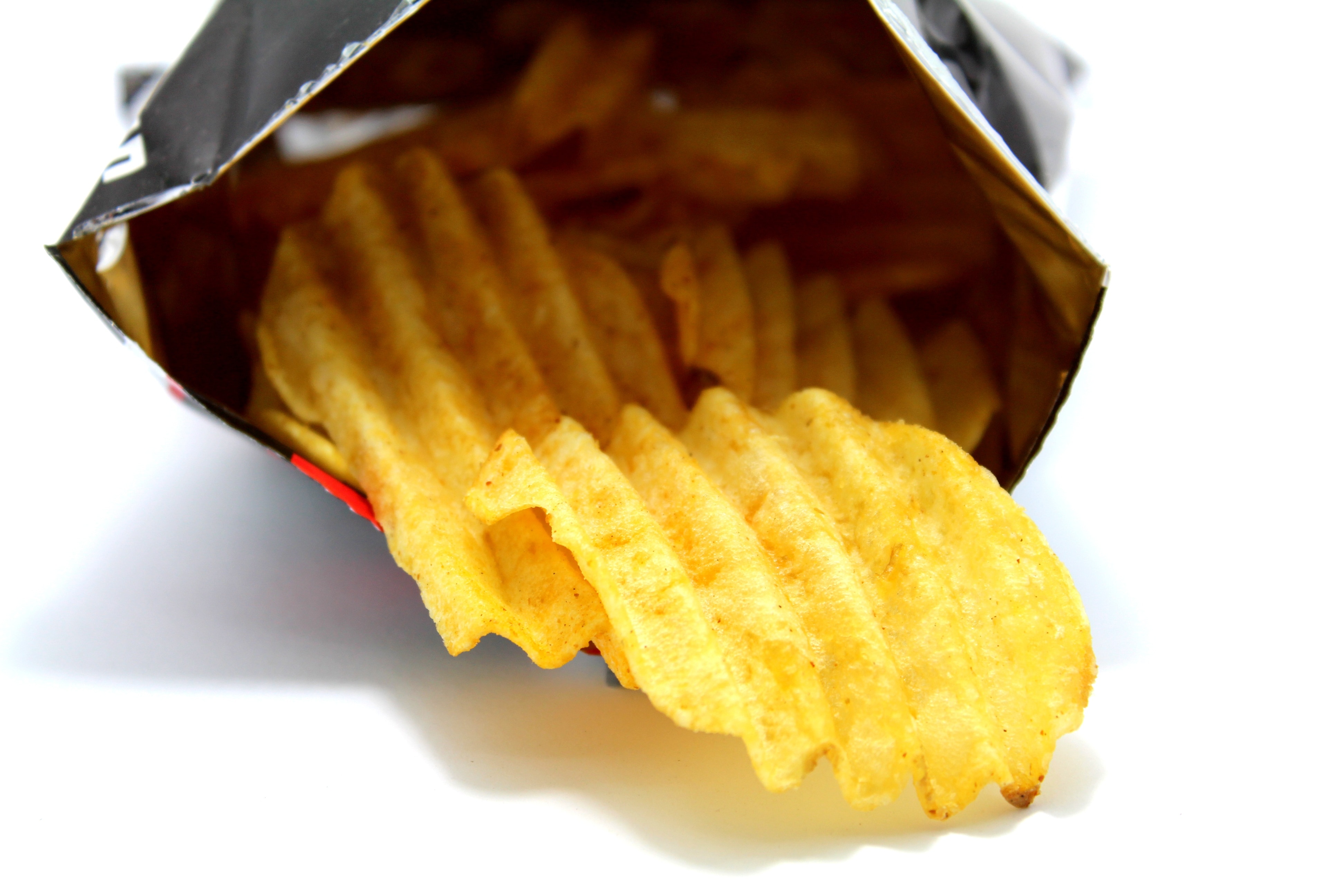 yellow chips on plastic pack