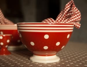 white and red ceramic bowl thumbnail
