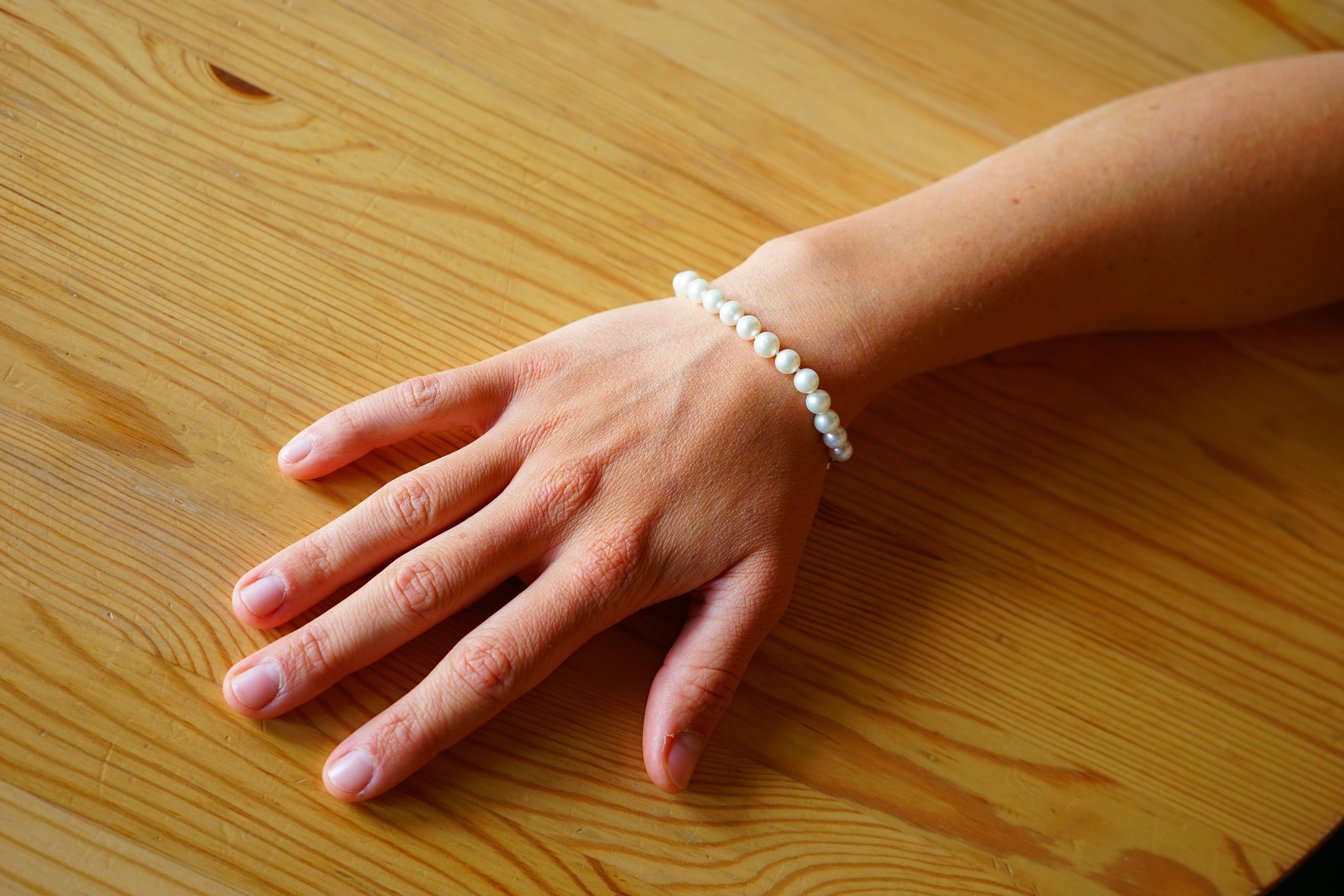 white pearl beaded bracelet