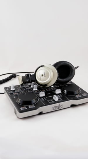 black and gray hercules dj conroller, gray headphones thumbnail