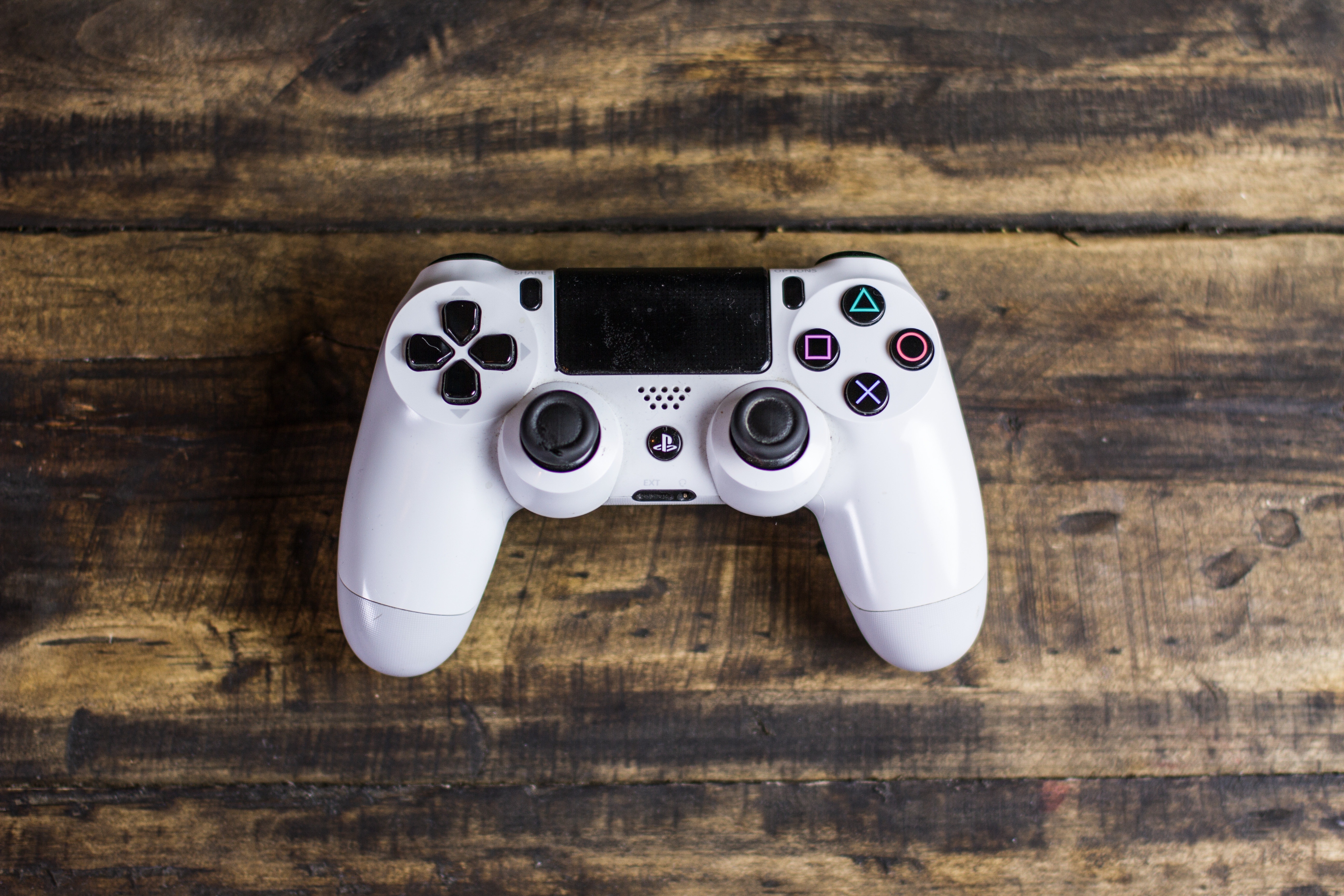 white sony ps4 controller