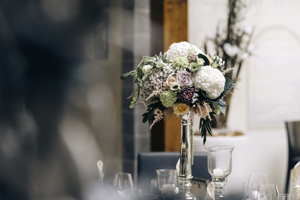 Shallow Depth Of Field Photo Of Flower Arrangement On Clear Glass