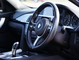 black bmw car steering wheel thumbnail