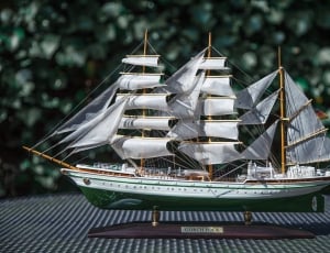 green and white sailboat scale model thumbnail