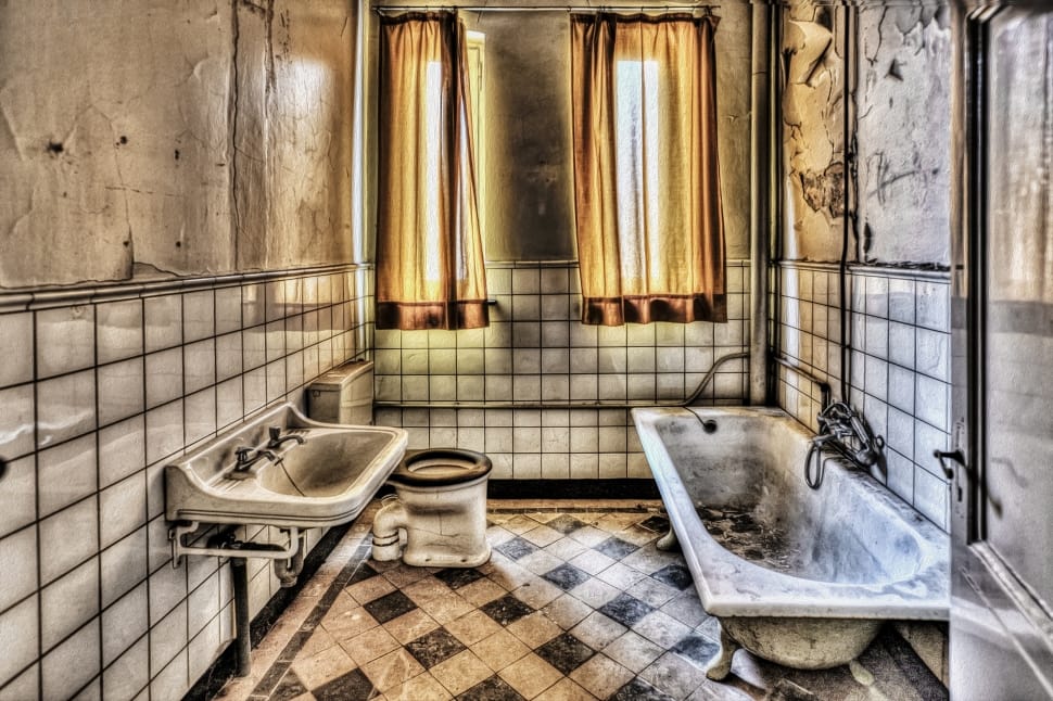bathroom ceramic bathtub, sink and toilet bowl preview