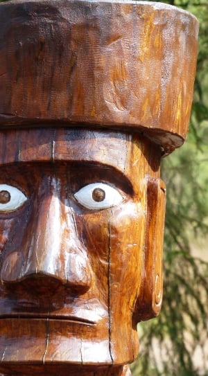 brown wooden tribal man face sculpture thumbnail