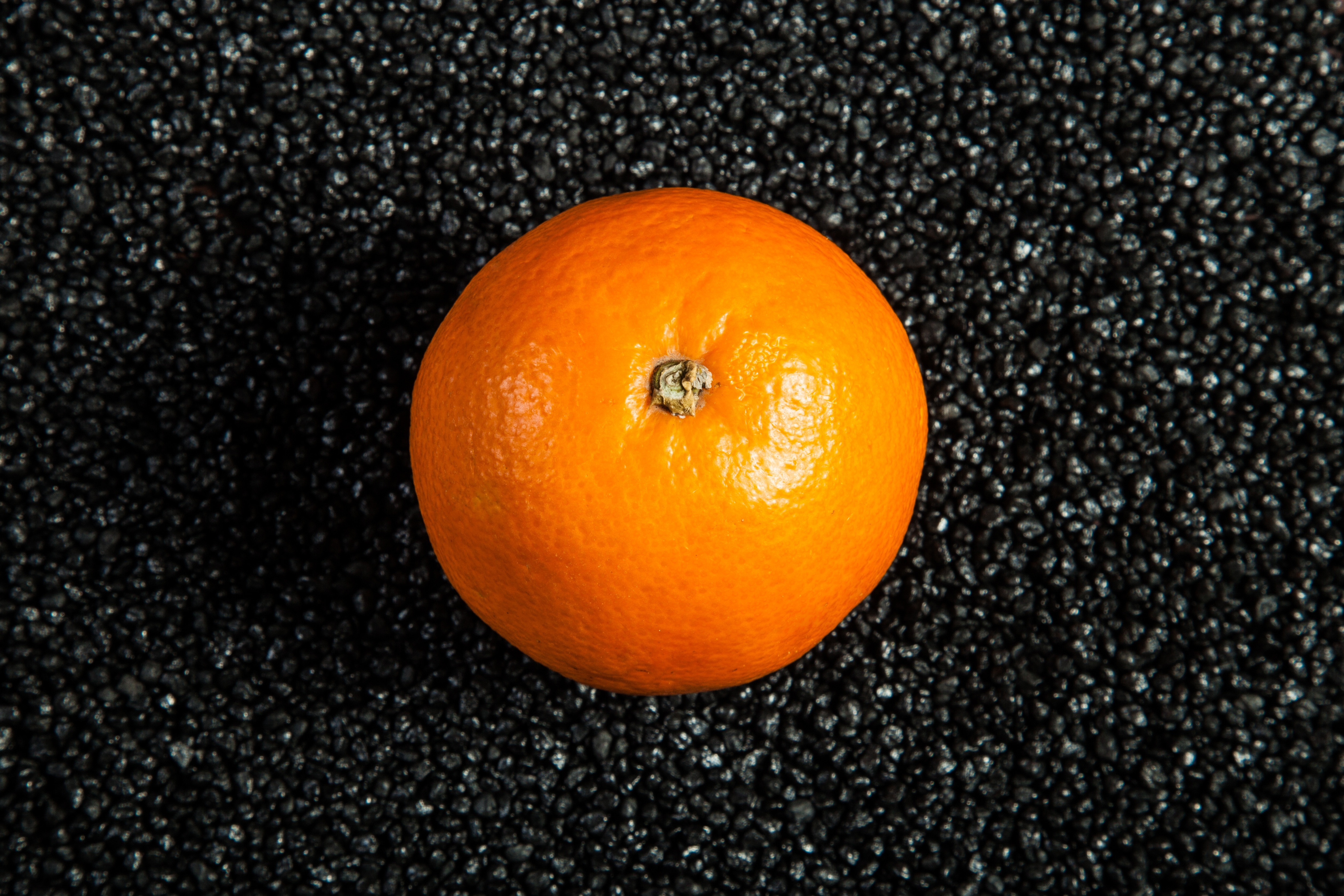 orange on black table during daytime