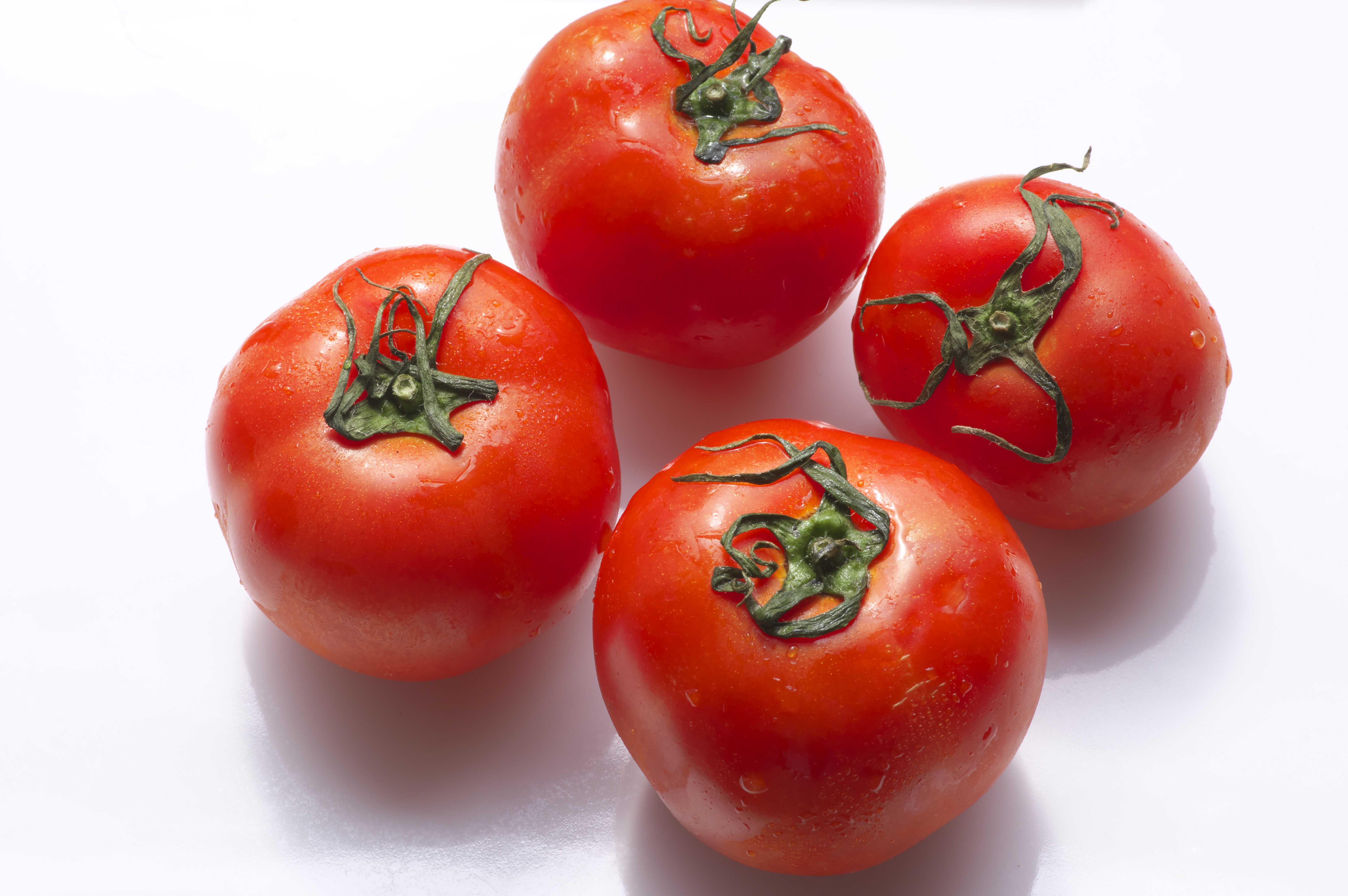 four red tomatoes