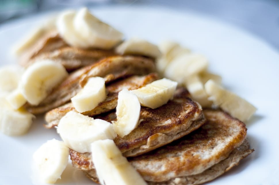 cooked round food with sliced bananas preview
