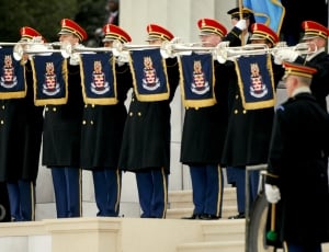 close photo of royal guards playing trumpet thumbnail