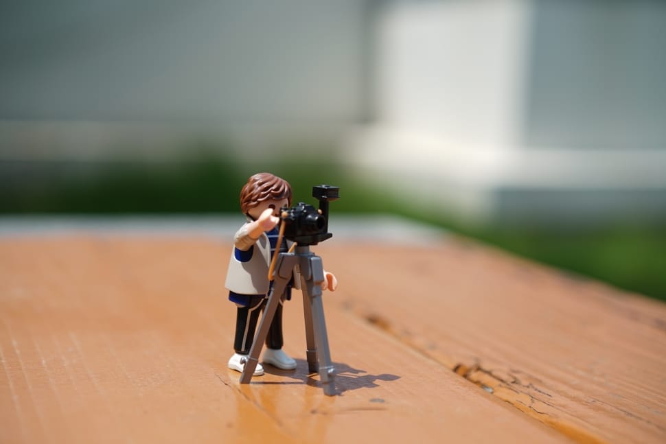 photo of Lego photographer standing in front of camera with tripod stand preview