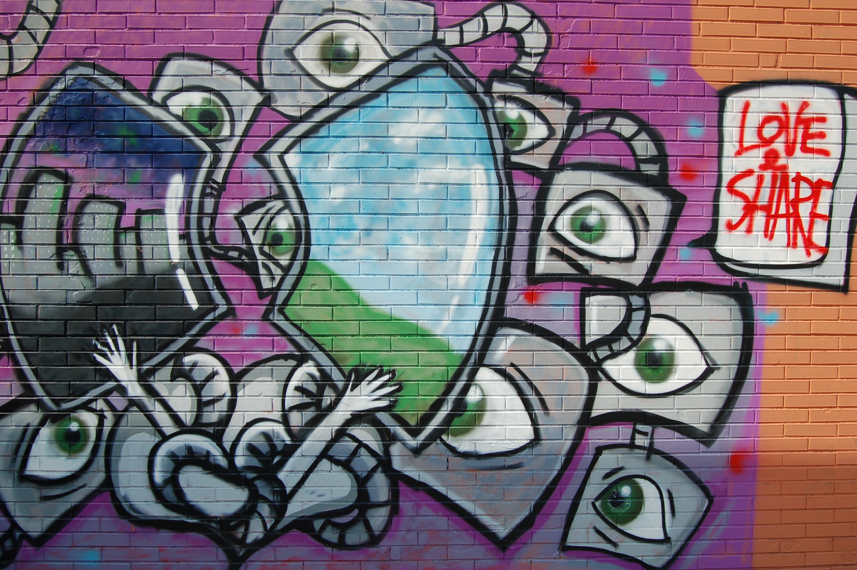 gray blue and white eye graffiti