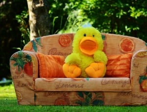 yellow and orange duck plush toy thumbnail