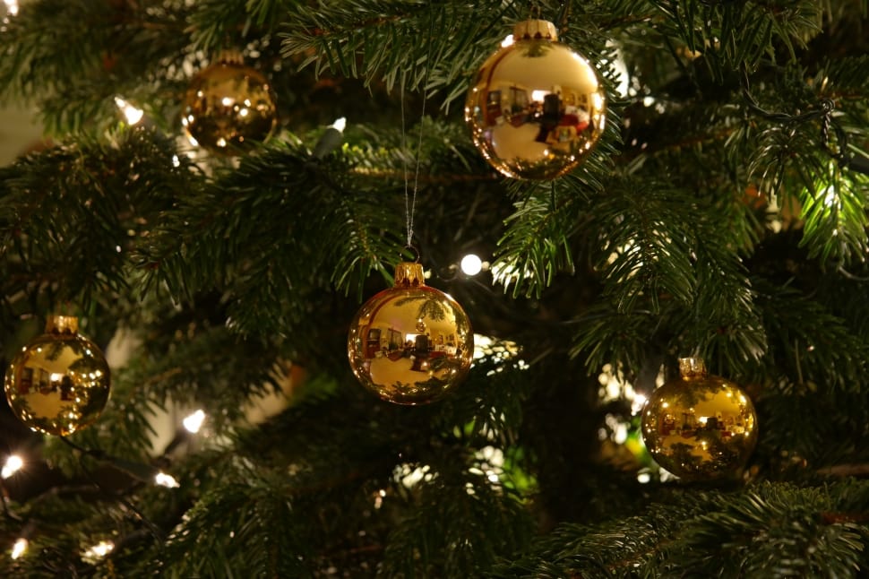 green christmas tree and gold baubles preview
