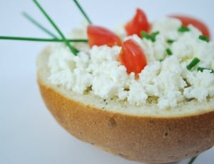 baked bread with tomatoes and white scrambled eggs thumbnail