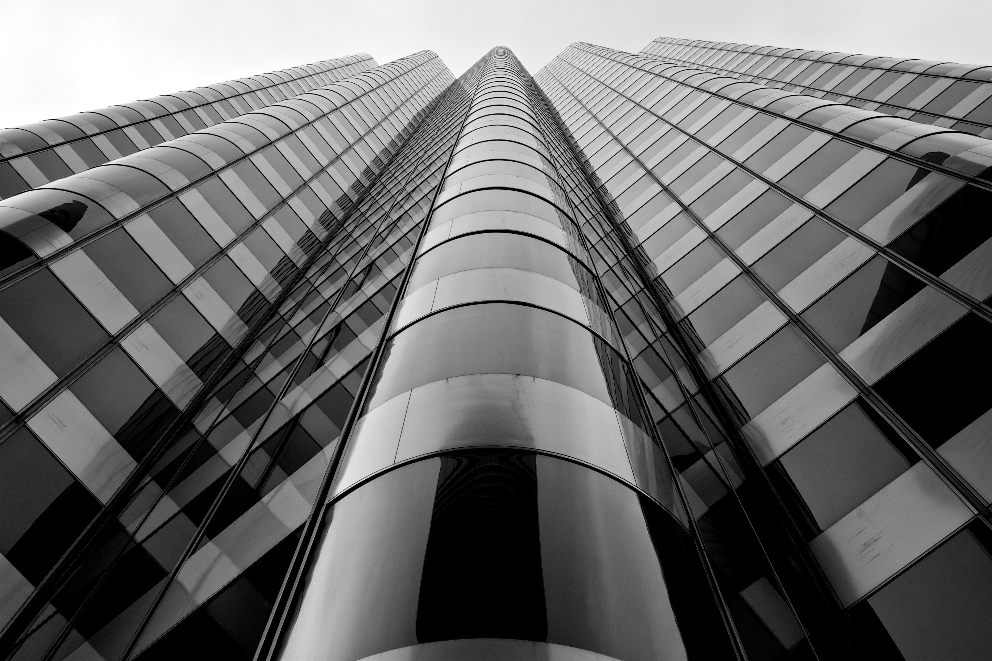 1366x768-wallpaper-gray-and-black-high-rise-building-peakpx
